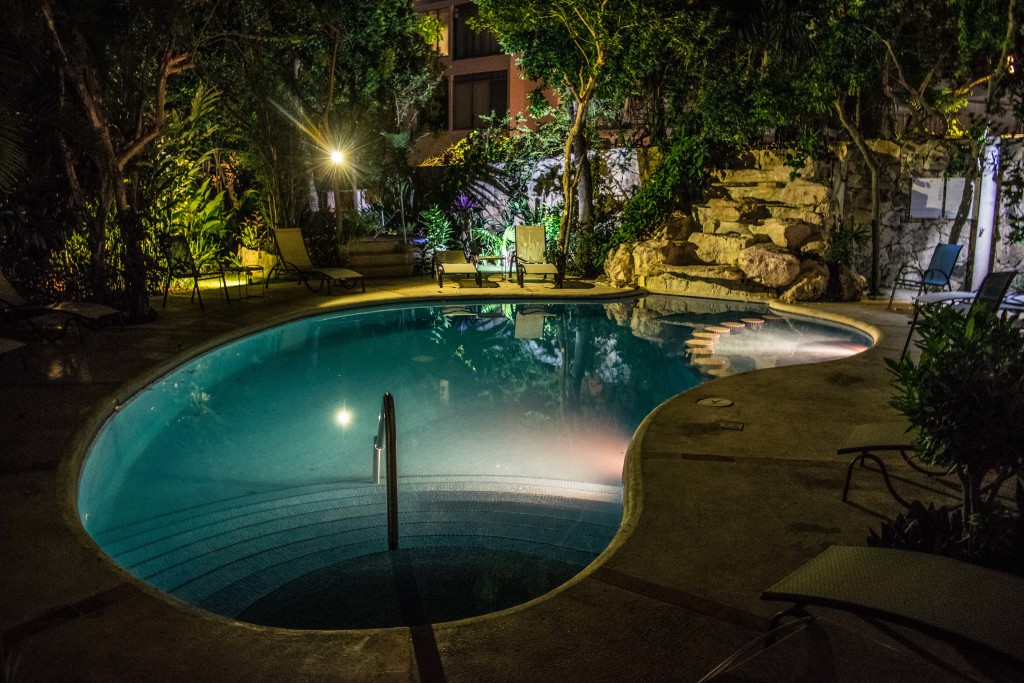 waterfall and pool at night