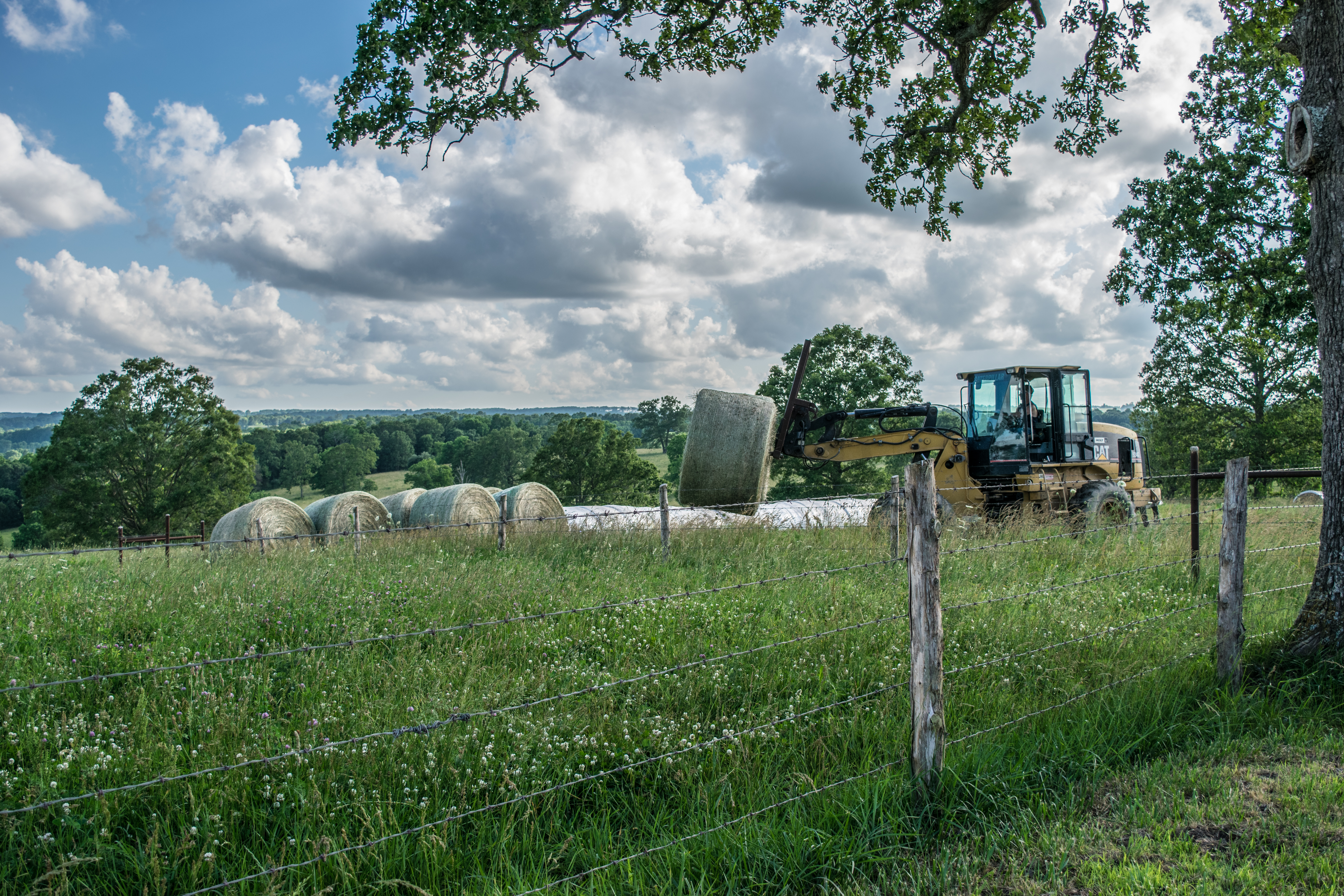 moving hay with the loader