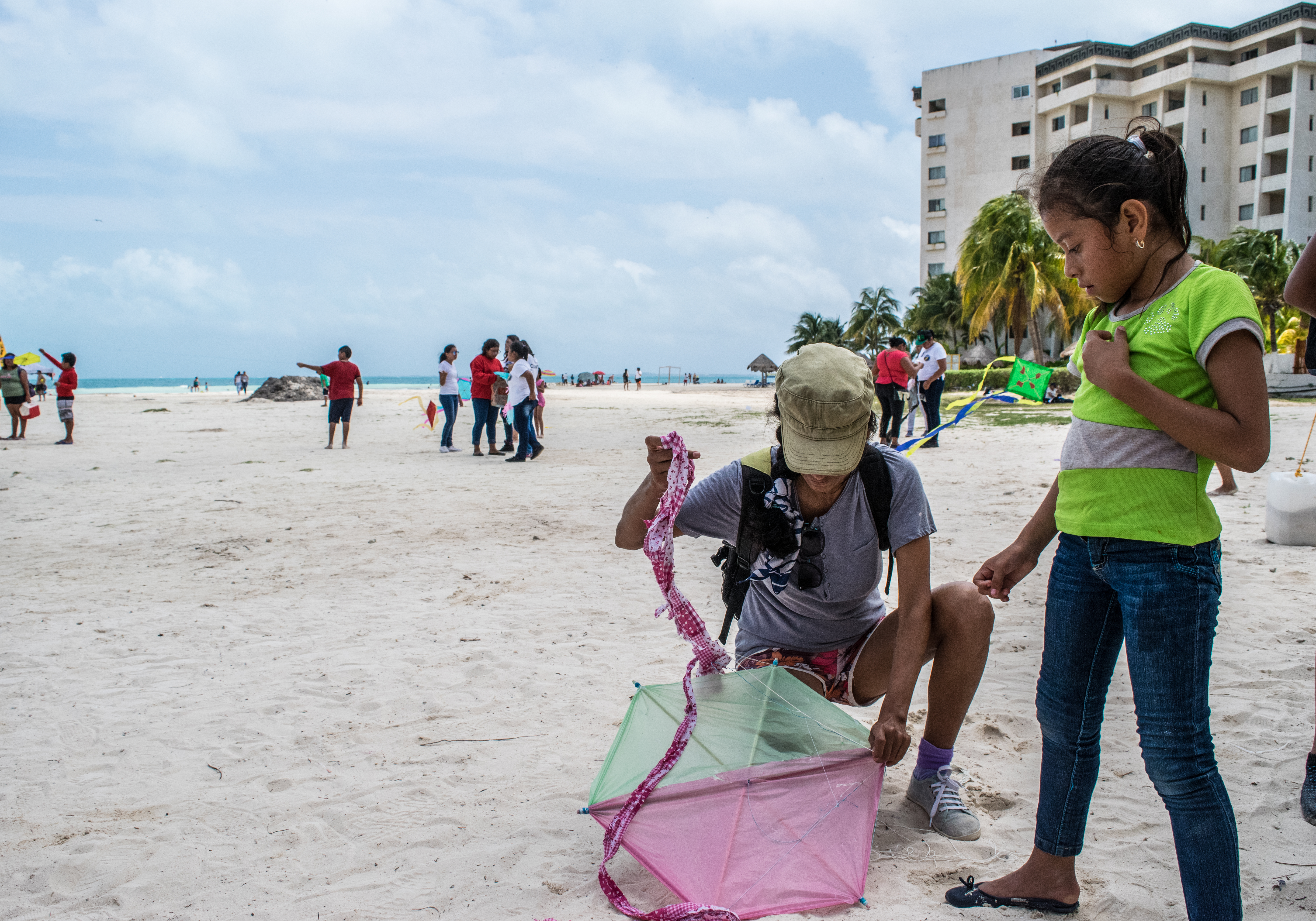 Cris helping a girl with her kite