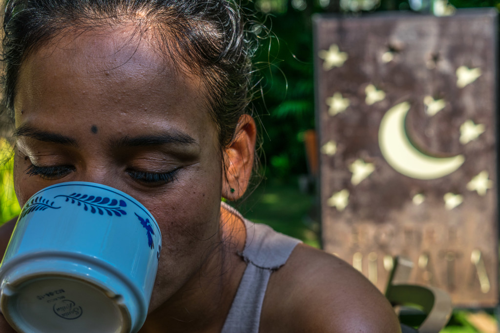 Cris drinking coffee at Hotel Lunata