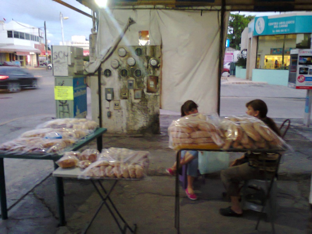 family selling bread