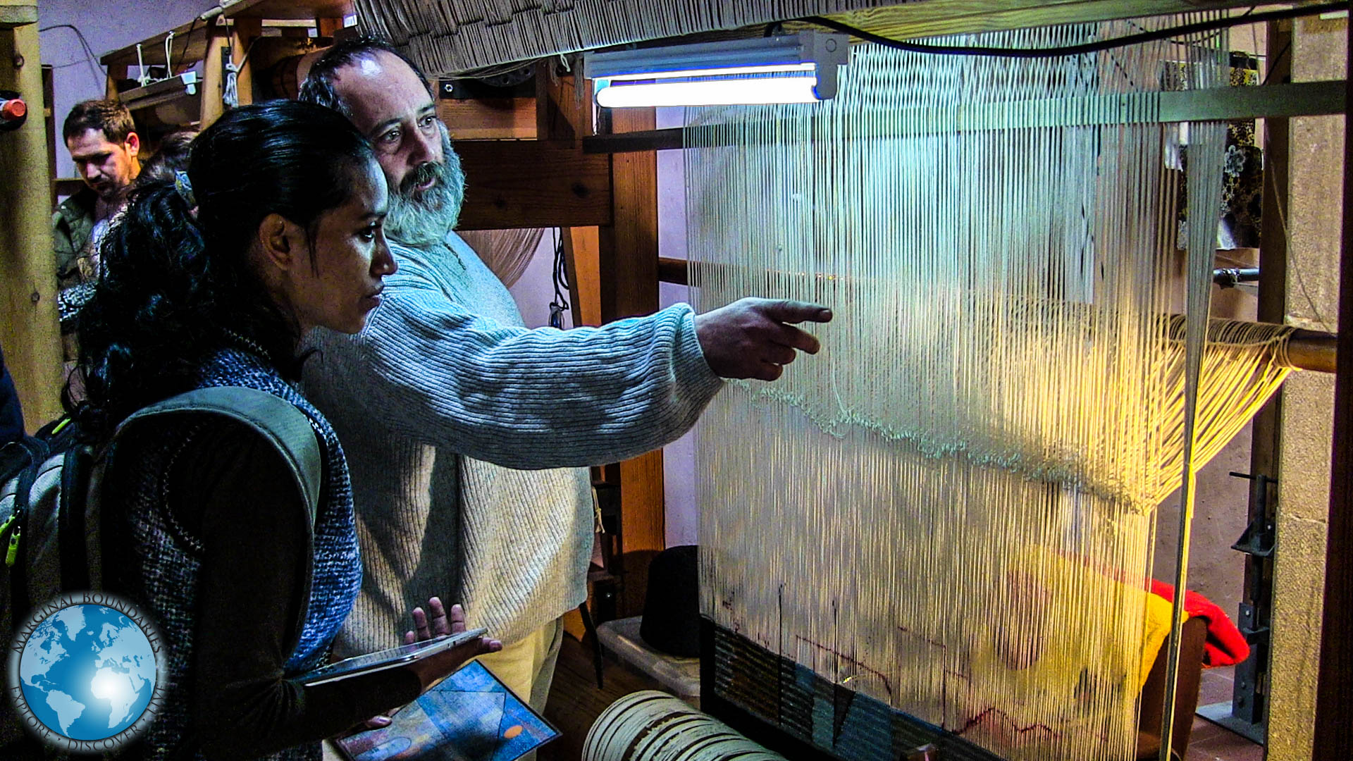 Maestro Babeus showing Cris the looms