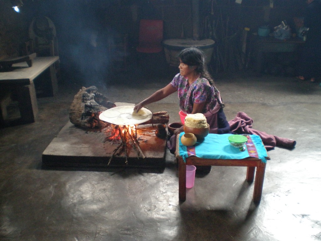 Woman making fresh tortillas in San Juan Chamula